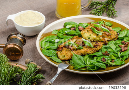 Rabbit steaks with herbs and sour cream 39832296