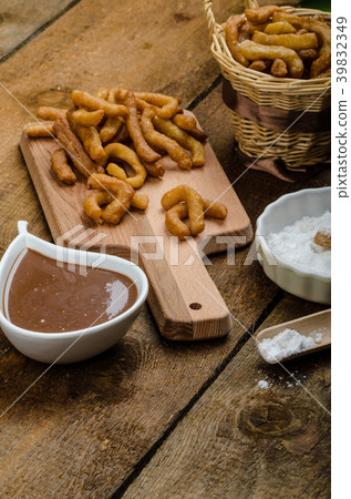 Churros with chocolate dip - Streed food, deep fried 39832349