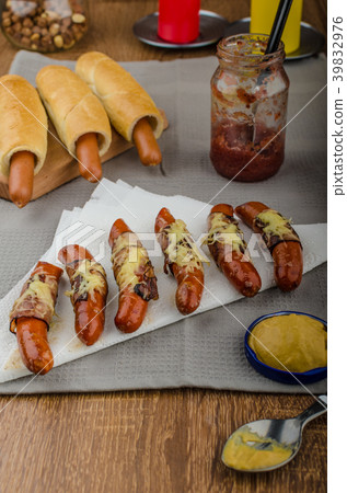 Fried sausage in a robe of bacon and cheese 39832976