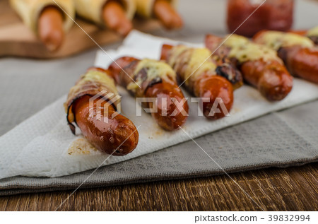 Fried sausage in a robe of bacon and cheese 39832994