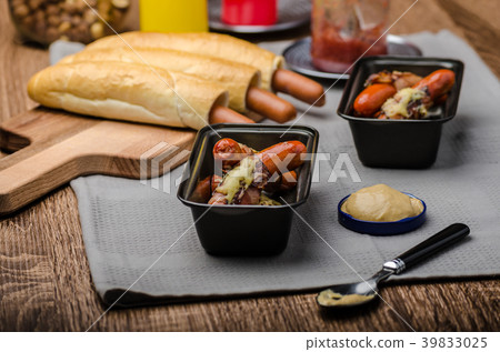 Fried sausage in a robe of bacon and cheese 39833025