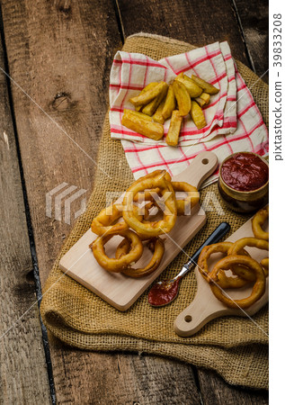 Onion rings, hot dip, french fries and Czech beer 39833208