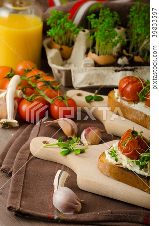 Roasted Cherry Tomato Sauce and Ricotta on Toast 39833597