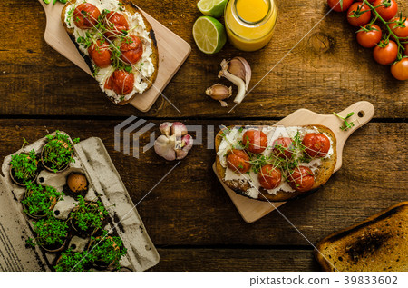 Roasted Cherry Tomato Sauce and Ricotta on Toast 39833602