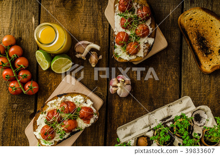 Roasted Cherry Tomato Sauce and Ricotta on Toast 39833607