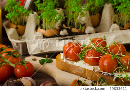 Roasted Cherry Tomato Sauce and Ricotta on Toast 39833611