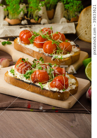 Roasted Cherry Tomato Sauce and Ricotta on Toast 39833621