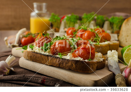 Roasted Cherry Tomato Sauce and Ricotta on Toast 39833628