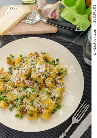 Homemade Gnocchi with Peas and Parmesan Homemade Gnocchi with Peas and Parmesan 39834201
