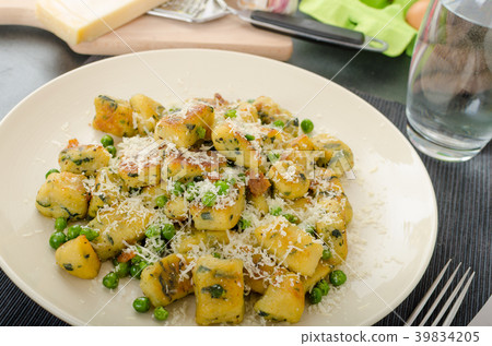 Homemade Gnocchi with Peas and Parmesan Homemade Gnocchi with Peas and Parmesan 39834205