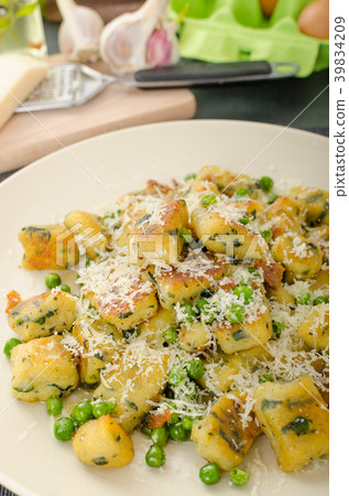 Homemade Gnocchi with Peas and Parmesan Homemade Gnocchi with Peas and Parmesan 39834209