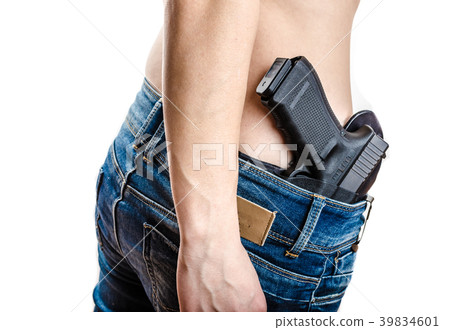 Concealed carry gun in his waistband 39834601