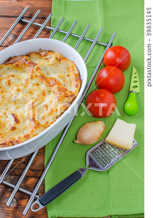 Lasagne bolognese in a baking dish 39835145