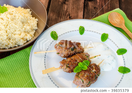 Beef kebab with with couscous Beef kebab with with couscous 39835379