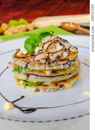Grilled eggplant with feta cheese,parmesan basil, nuts 39835385