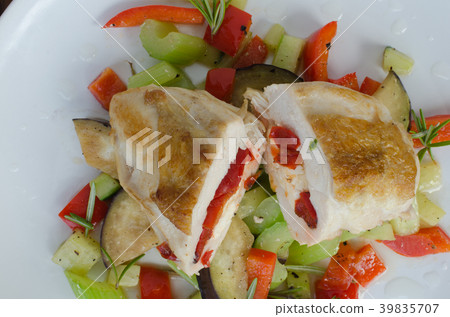 Grilled chicken breast with feta cheese 39835707