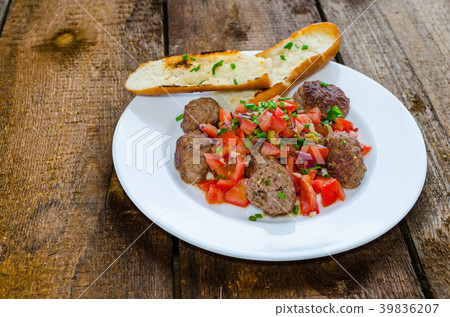 Meatballs with spicy tomato salsa 39836207