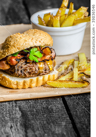 Beef burger with bacon, cheddar, homemade fries Beef burger with bacon, cheddar, homemade fries 39836546