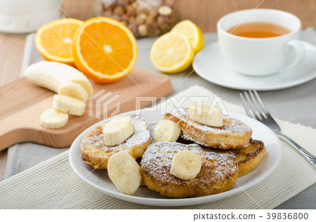 French toast to sweet, with banana sprinkled with sugar French toast to sweet, with banana sprinkled with sugar 39836800