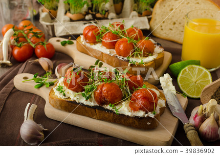 Roasted Cherry Tomato Sauce and Ricotta on Toast 39836902