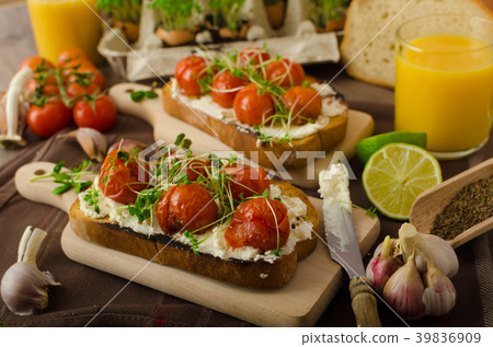 Roasted Cherry Tomato Sauce and Ricotta on Toast 39836909
