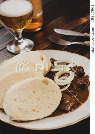 Goulash with dumplings Goulash with dumplings 39837961
