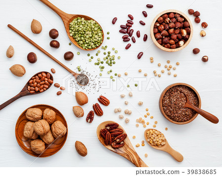 Various legumes and different kinds of nuts . Various legumes and different kinds of nuts . 39838685