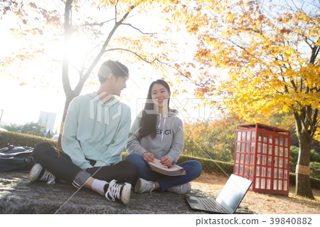 College students couple on fall campus 39840882