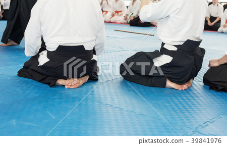 People in kimono on martial arts weapon training 39841976