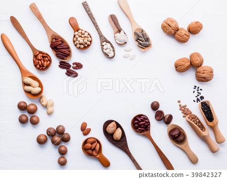 Spoon of various legumes and different of nuts  39842327