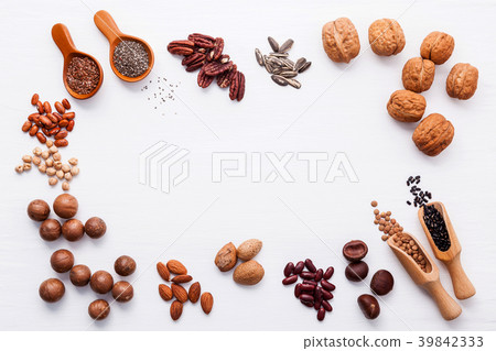 Spoon of various legumes and different of nuts  39842333