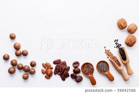 Spoon of various legumes and different of nuts . 39842586
