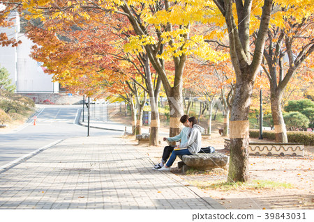 College students couple on fall campus 39843031