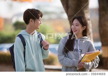 College students couple on fall campus 39844669