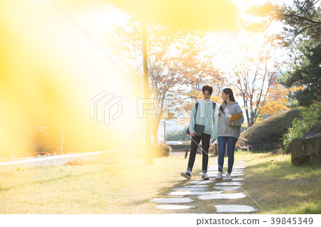 College students couple on fall campus 39845349