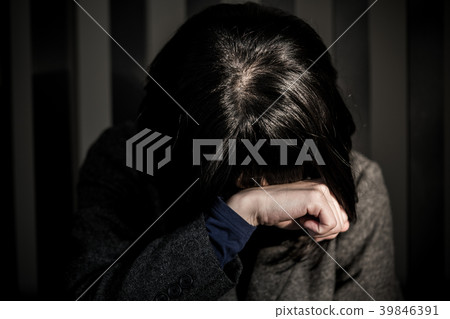 Business woman falling in front of fence Business woman falling in front of fence 39846391