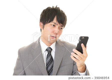 與一個疲乏的表示的一個商人 39846954