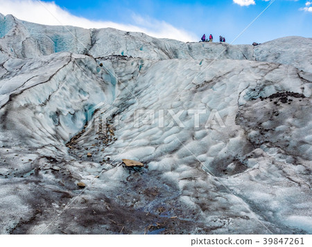 Water from melting ice flowing down 39847261