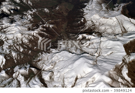 View from plane to snow capped peaks of Caucasus 39849124