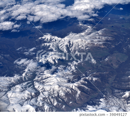 View from plane to snow capped peaks of Caucasus 39849127