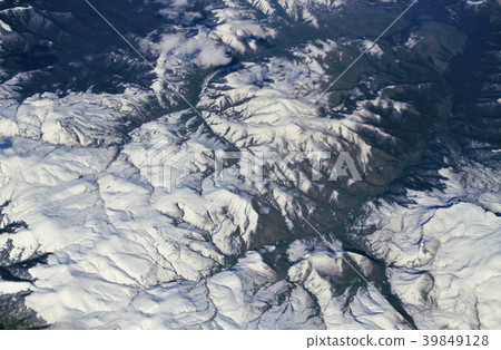 View from plane to snow capped peaks of Caucasus 39849128