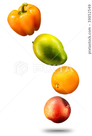 Falling fruits and vegetables on white background Falling fruits and vegetables on white background 39852549