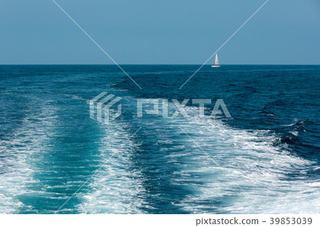 Trace on water sea and sailing vessel in far 39853039