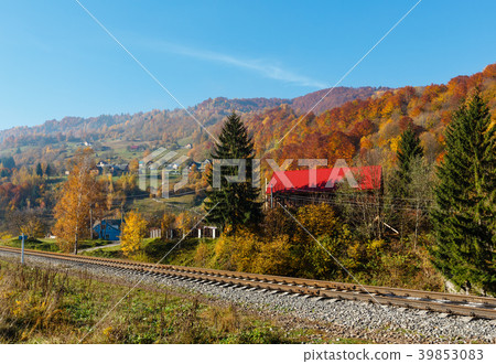 Autumn Carpathian mountains, village and railroad Autumn Carpathian mountains, village and railroad 39853083