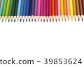 Colored pencils arranged in a row on a white background 39853624