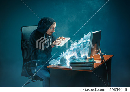 Young stressed handsome businessman working at Young stressed handsome businessman working at 39854446