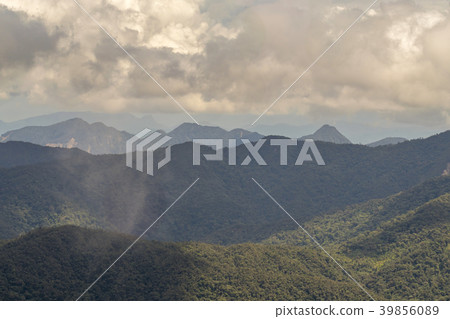 Cumulus clouds forming over the Cordillera del Con Cumulus clouds forming over the Cordillera del Con 39856089