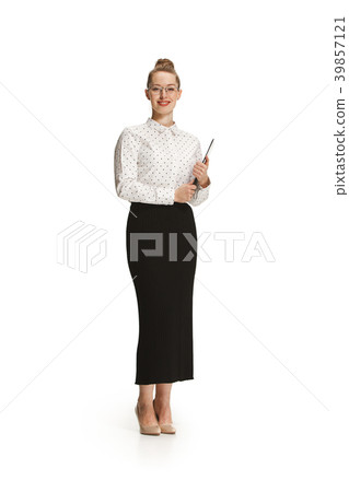 Full length portrait of a smiling female teacher Full length portrait of a smiling female teacher 39857121