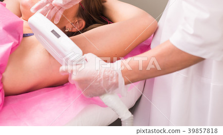 Hair removal cosmetology procedure from a Hair removal cosmetology procedure from a 39857818