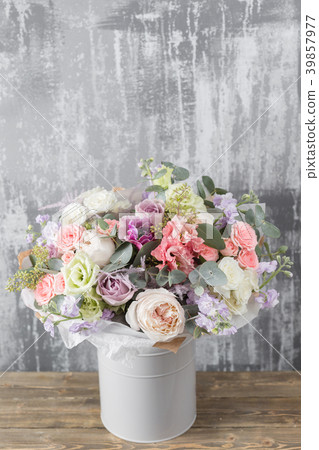 Close-up Beautiful Bouquet. Spring flowers on gray 39857977